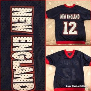 Brand new without tags this is a size med dog Airwick New England football top